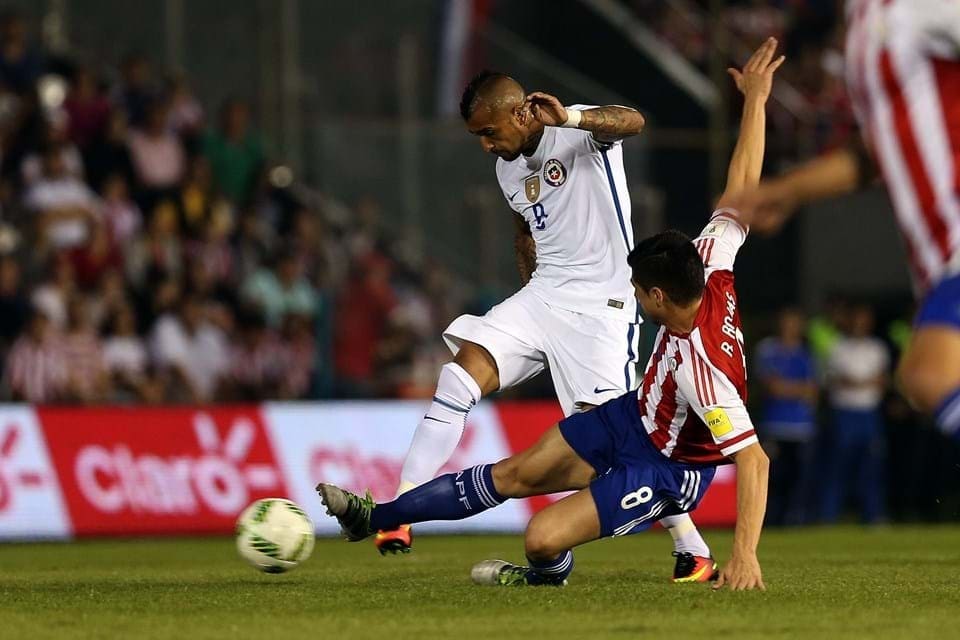 footballer kicking a ball